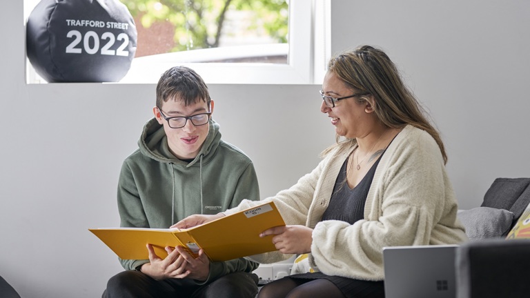 Supported Living Colleagues Shows Teenager New Home Information Pack